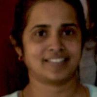 Woman wearing t shirt, smiling